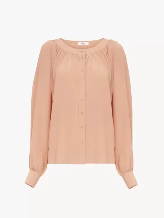 Blusa con cuello redondo en crepé de China