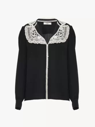 Blusa con volantes en crepé de China y encaje