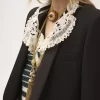 Blusa con volantes en crepé de China y encaje