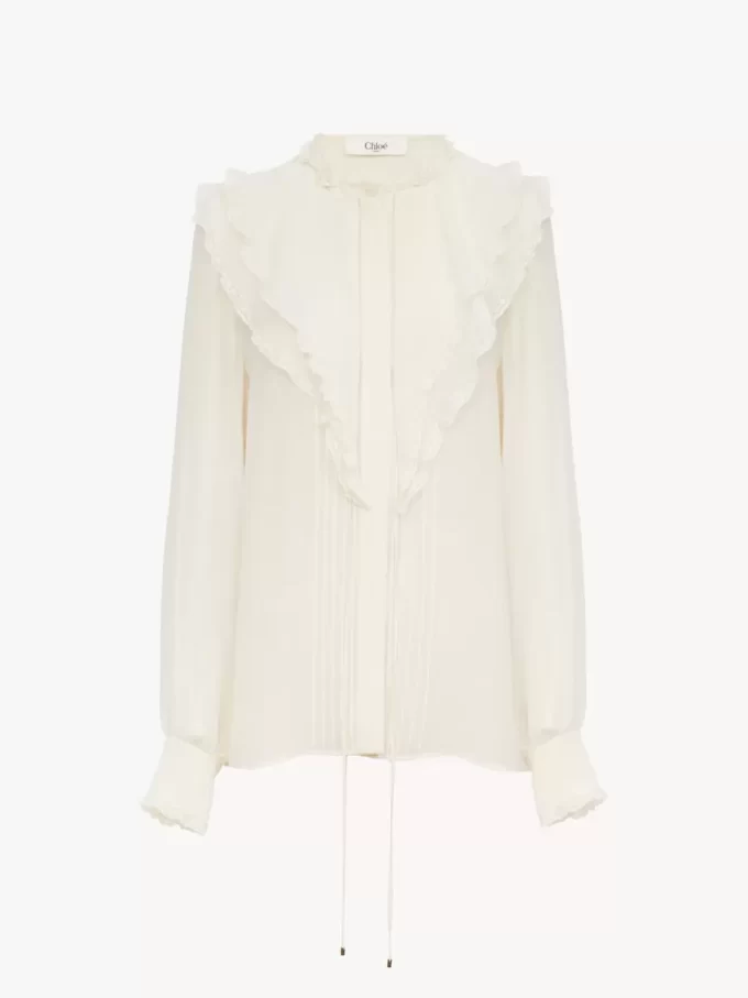 Blusa con volantes en georgette de seda