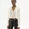 Blusa con volantes en georgette de seda