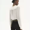 Blusa con volantes en georgette de seda