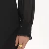 Blusa con volantes en georgette de seda