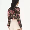 Blusa con volantes y cuello en V en charmeuse de seda