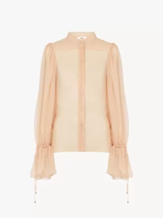 Blusa de mangas abullonadas en muselina de seda