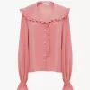 Blusa fluida con volantes en crepé de China
