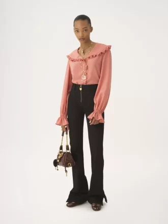 Blusa fluida con volantes en crepé de China