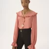 Blusa fluida con volantes en crepé de China