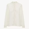 Blusa fluida de georgette de seda y encaje