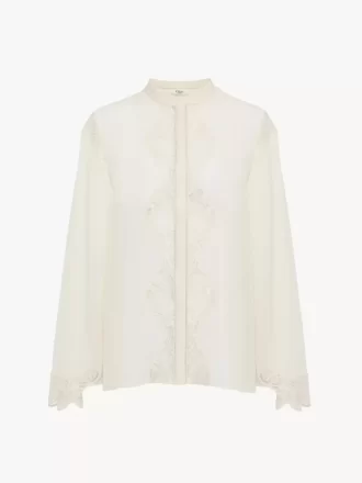 Blusa fluida de georgette de seda y encaje