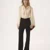 Blusa fluida de georgette de seda y encaje