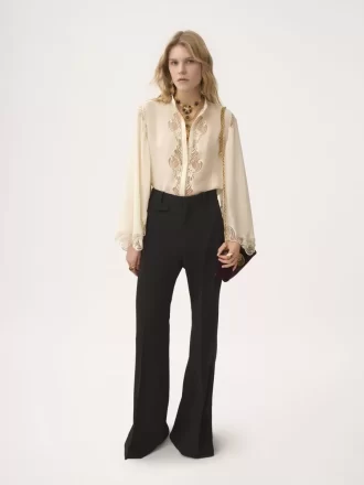 Blusa fluida de georgette de seda y encaje