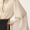 Blusa fluida de georgette de seda y encaje