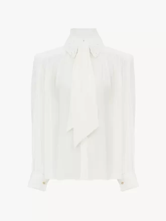 Blusa fruncida con lazo en crepé de China y encaje