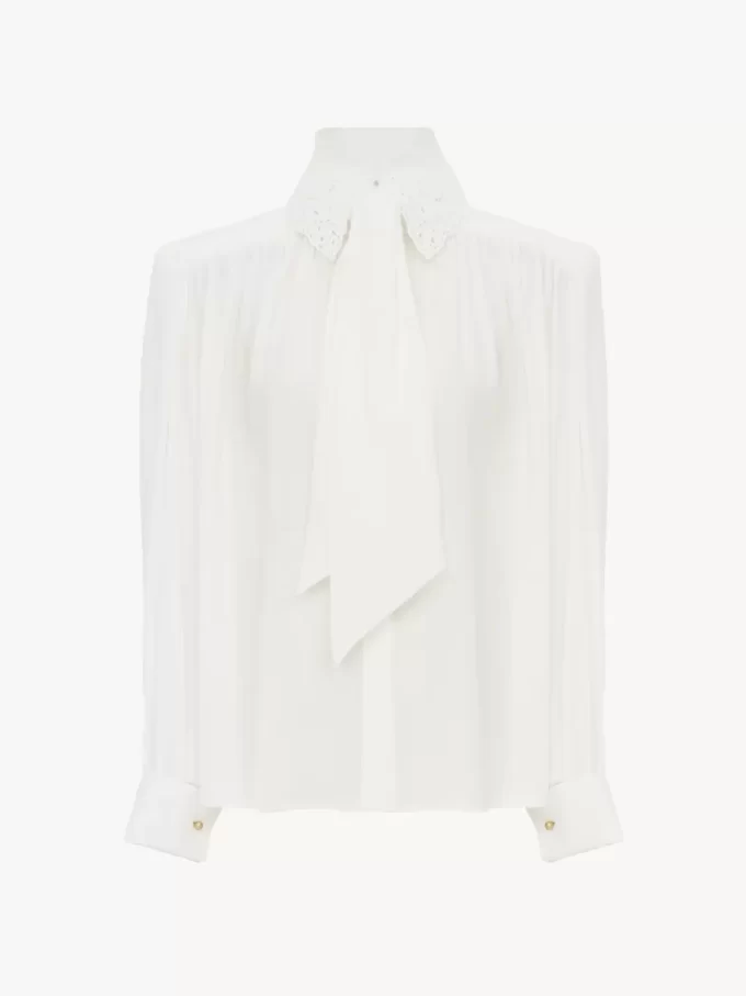 Blusa fruncida con lazo en crepé de China y encaje