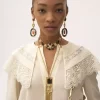 Blusa fruncida en crepé de China y encaje