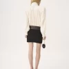 Blusa oversize con volantes en jacquard de seda Blusa oversize con volantes en jacquard de seda