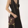 Bolso con solapa y cadena Château Treasures en piel granulada Bolso con solapa y cadena Château Treasures en piel granulada