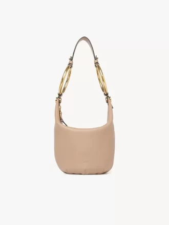 Bolso de mano pequeño tipo pulsera en piel granulada