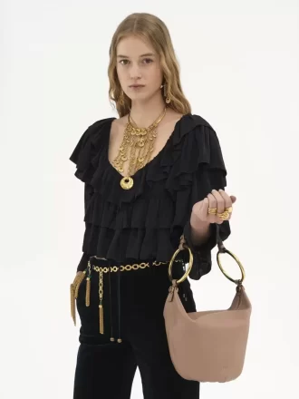 Bolso de mano pequeño tipo pulsera en piel granulada