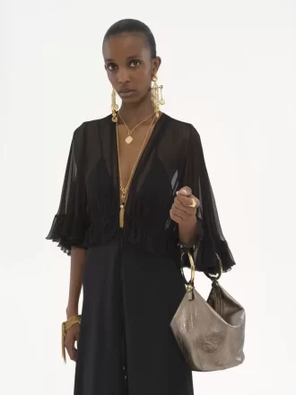 Bolso de mano pequeño tipo pulsera en piel metalizada