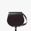 Bolso de sillín Marcie en piel brillante