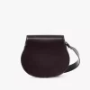 Bolso de sillín Marcie en piel brillante