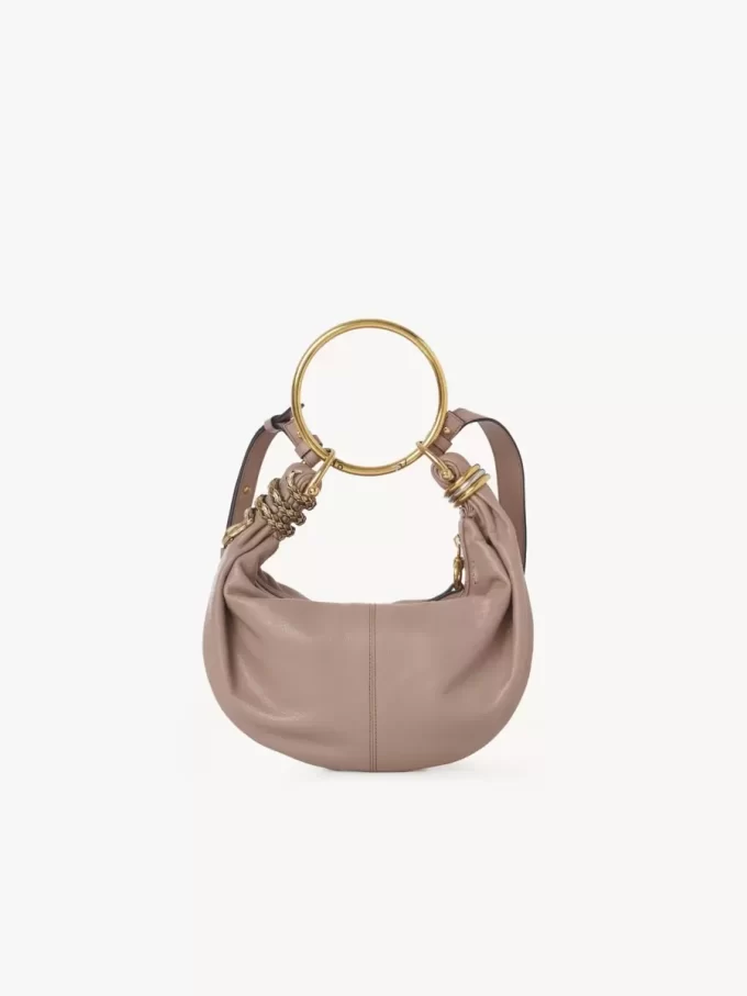Bolso hobo con pulsera de serpiente pequeña en piel granulada Bolso hobo con pulsera de serpiente pequeña en piel granulada