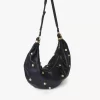 Bolso hobo de pulsera grande en piel granulada con tachuelas Bolso hobo de pulsera grande en piel granulada con tachuelas
