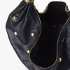Bolso hobo de pulsera grande en piel granulada con tachuelas Bolso hobo de pulsera grande en piel granulada con tachuelas