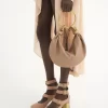 Bolso Hobo pequeño tipo pulsera en piel granulada