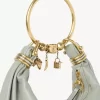 Bolso Hobo pequeño tipo pulsera en piel granulada