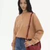 Bolso Hobo pequeño tipo pulsera en piel granulada