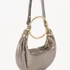 Bolso Hobo pequeño tipo pulsera en piel metalizada