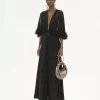 Bolso Hobo pequeño tipo pulsera en piel metalizada