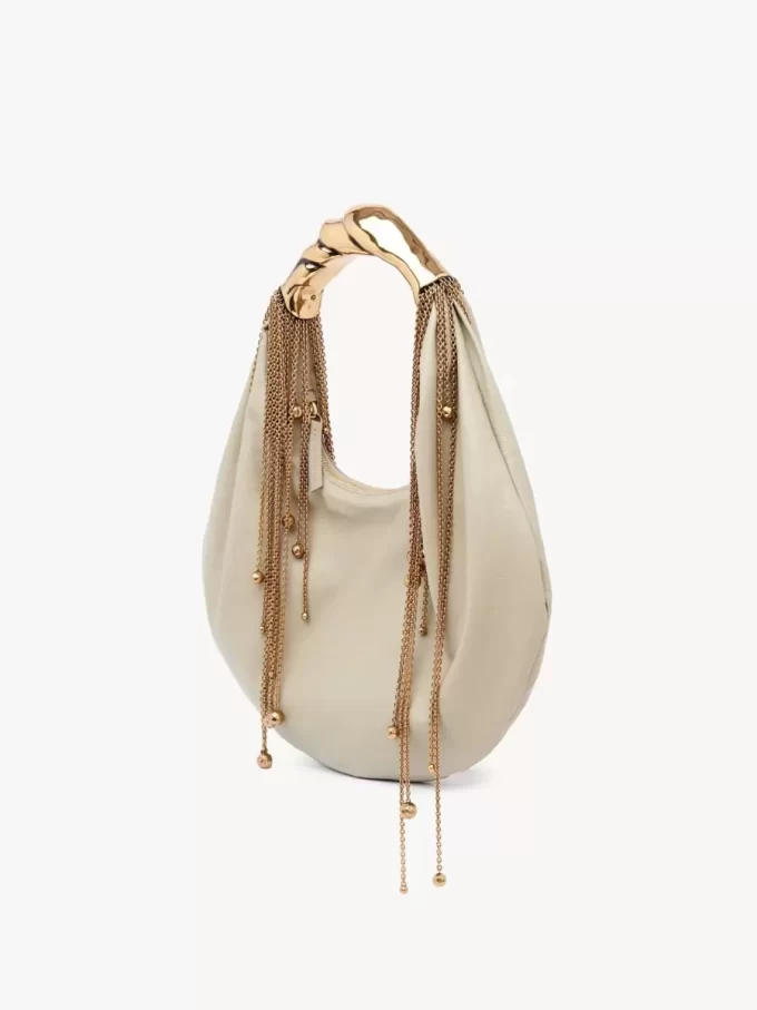 Bolso hobo Twisted Shell en piel brillante Bolso hobo Twisted Shell en piel brillante