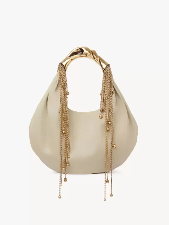 Bolso hobo Twisted Shell en piel brillante Bolso hobo Twisted Shell en piel brillante