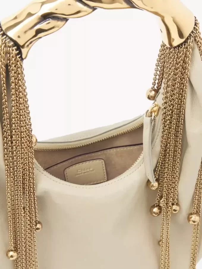 Bolso hobo Twisted Shell en piel brillante Bolso hobo Twisted Shell en piel brillante
