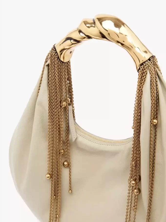 Bolso hobo Twisted Shell en piel brillante Bolso hobo Twisted Shell en piel brillante