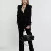 Bolso para cámara en piel brillante