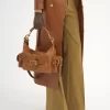 Bolso para cámara en piel brillante