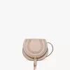 Bolso pequeño Marcie tipo sillín de piel brillante