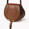 Bolso pequeño Marcie tipo sillín de piel brillante