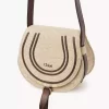 Bolso pequeño tipo sillín Marcie en fibras efecto rafia Bolso pequeño tipo sillín Marcie en fibras efecto rafia