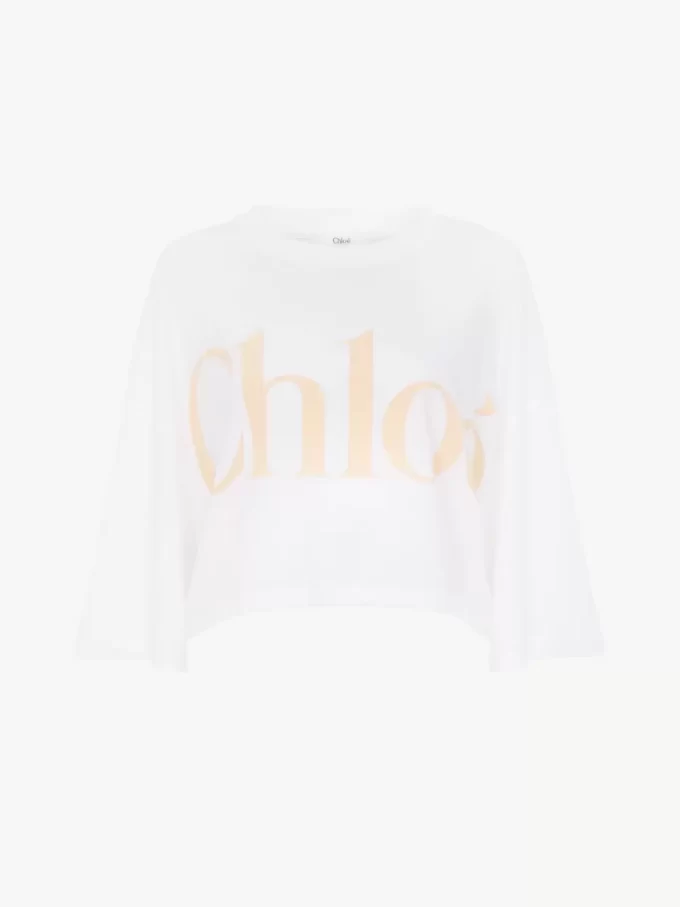 Camiseta oversize con logo recortado en jersey de algodón