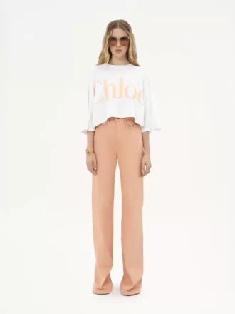 Camiseta oversize con logo recortado en jersey de algodón