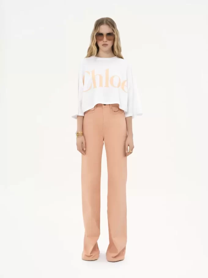 Camiseta oversize con logo recortado en jersey de algodón