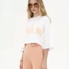 Camiseta oversize con logo recortado en jersey de algodón