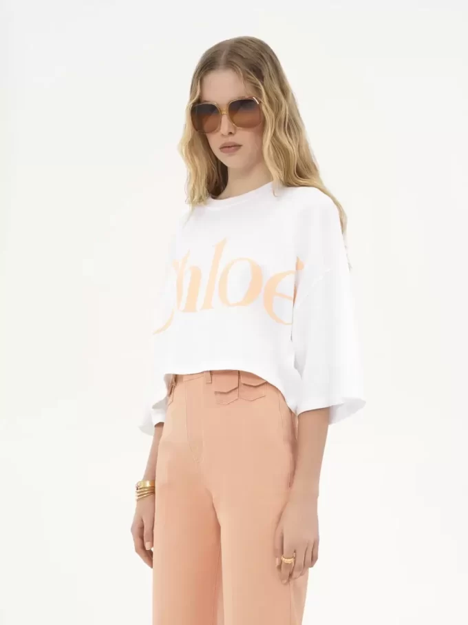 Camiseta oversize con logo recortado en jersey de algodón