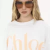 Camiseta oversize con logo recortado en jersey de algodón